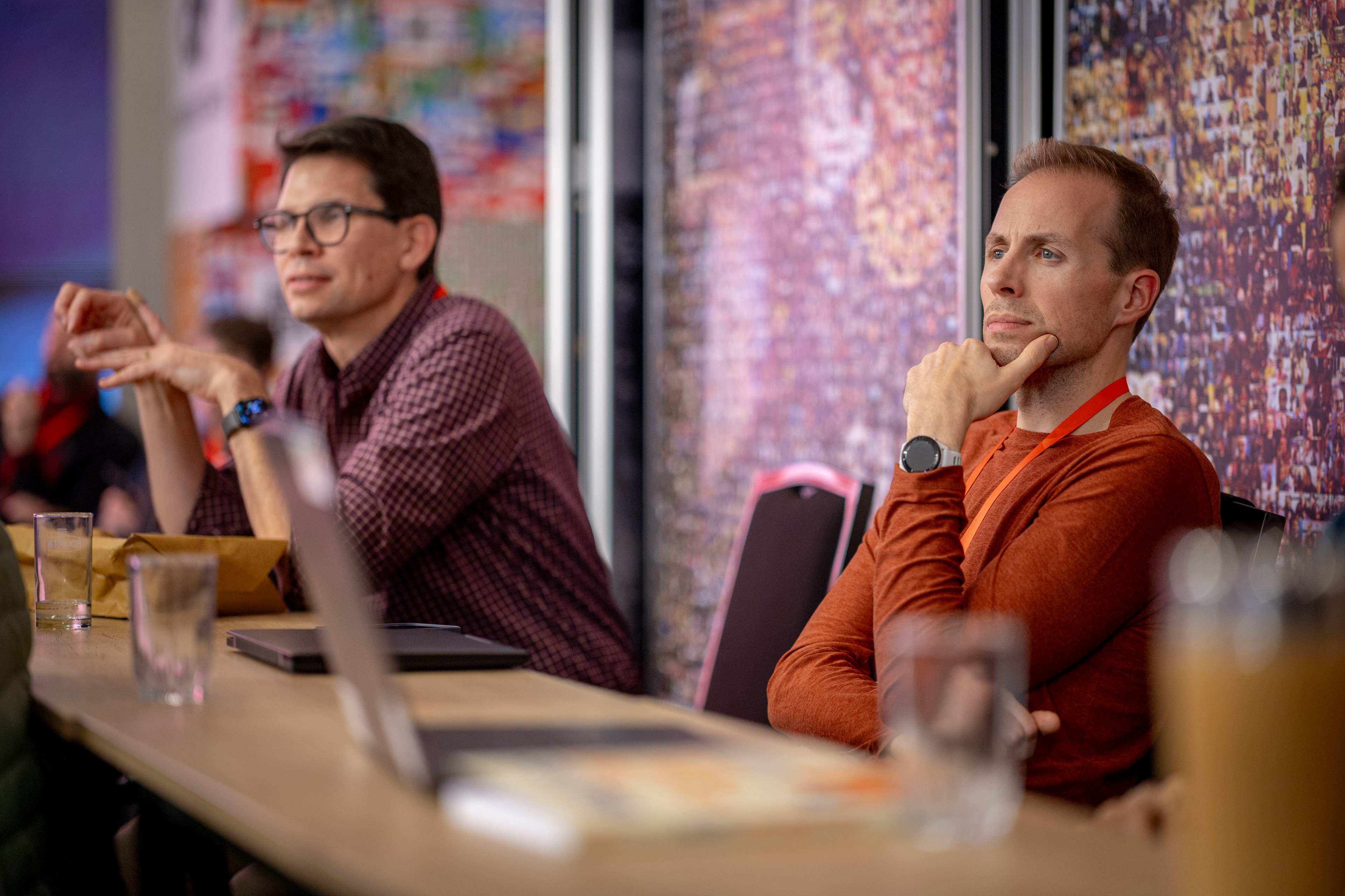 Jim listening to another participant during a discussion